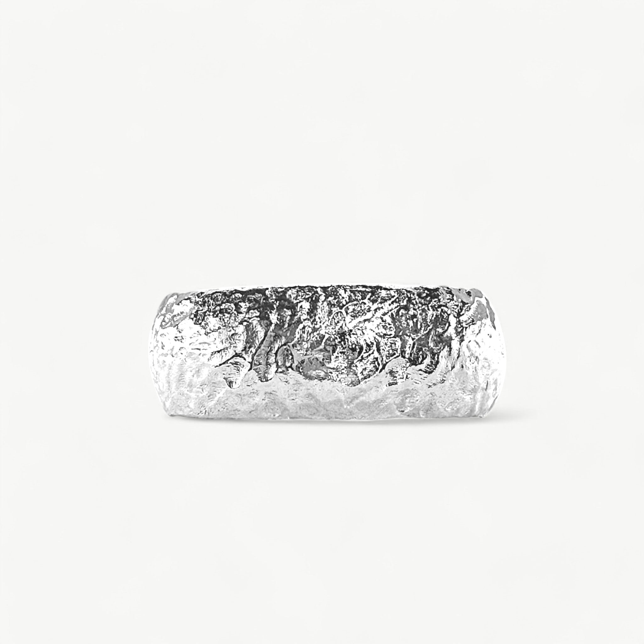 Silver D shaped textured rings