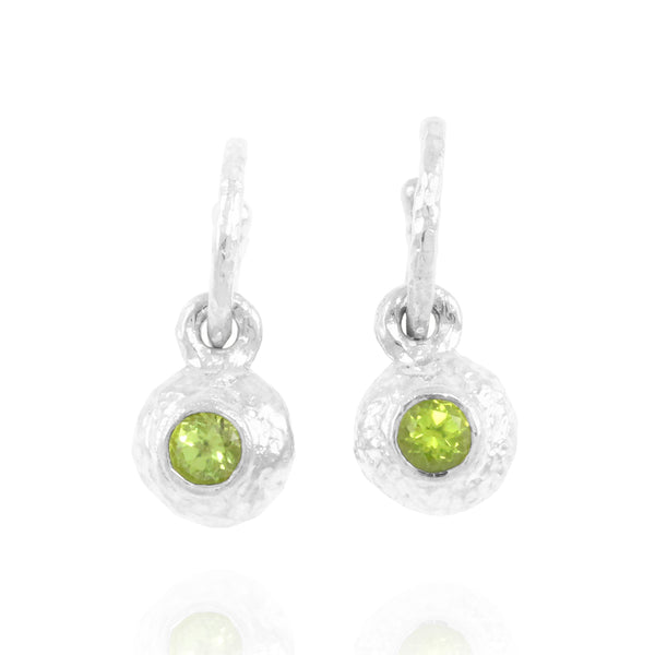 Silver earrings set with peridot gemstones. - paul magen