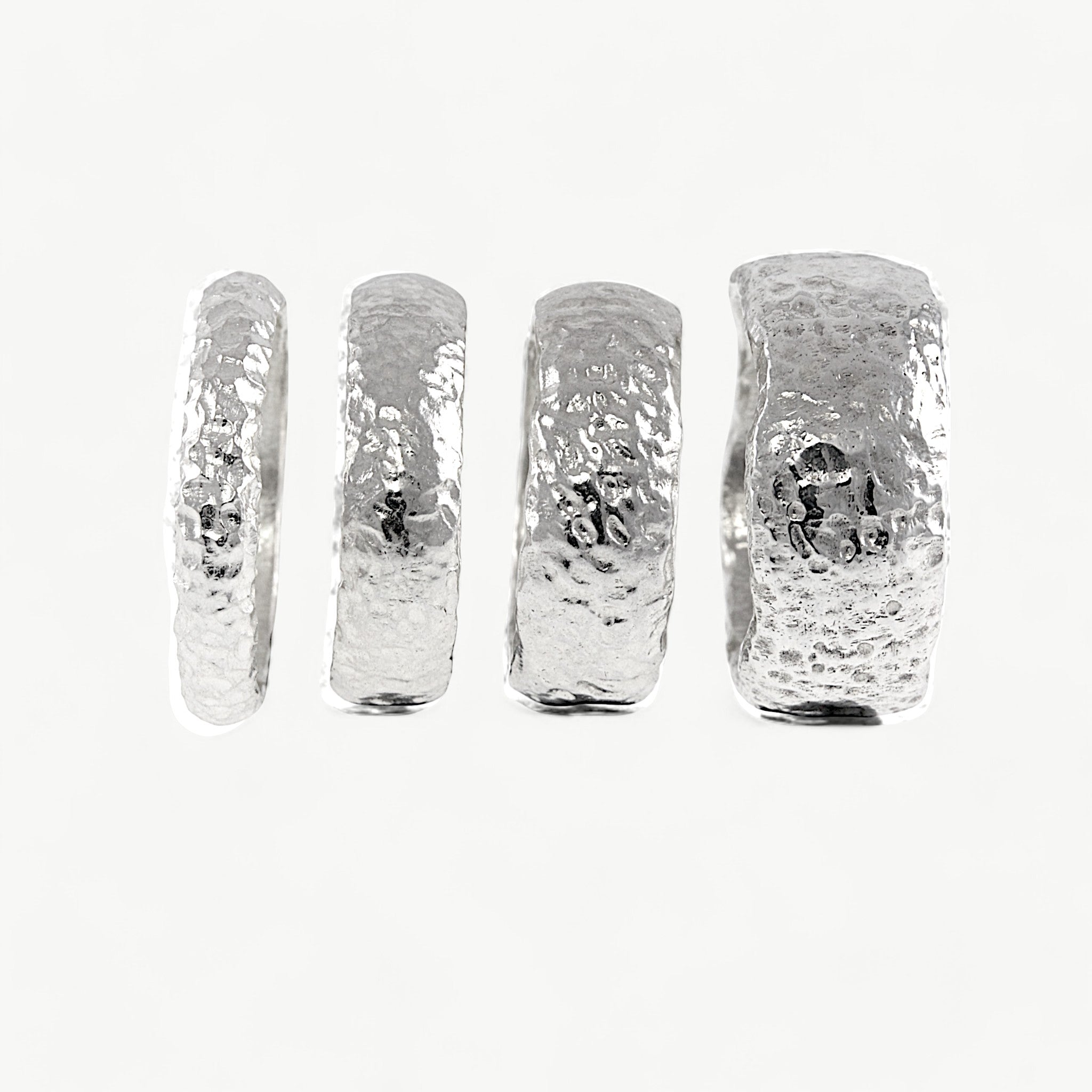 Silver D shaped textured rings