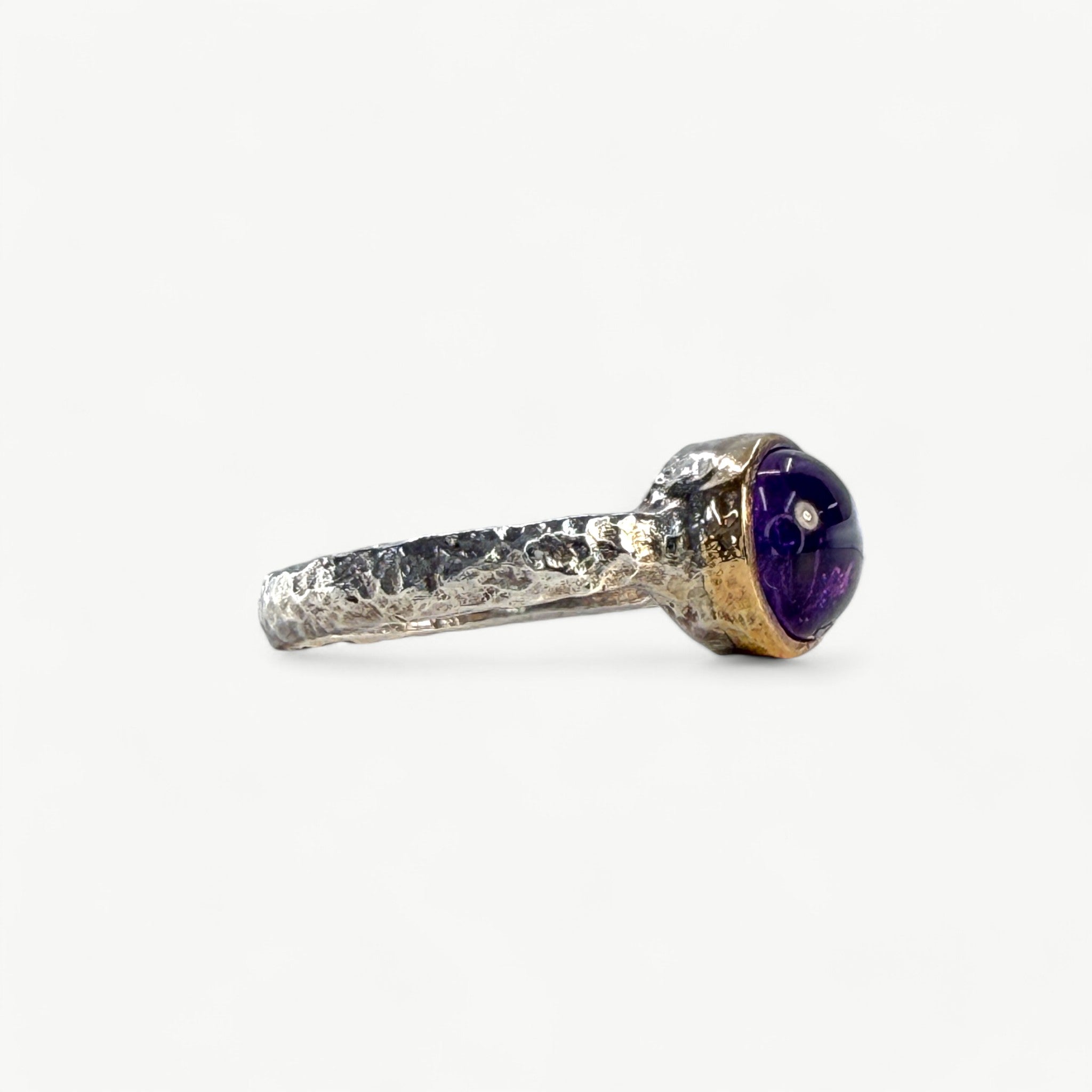 Silver Band with Cabochon Amethyst in a Gold Setting