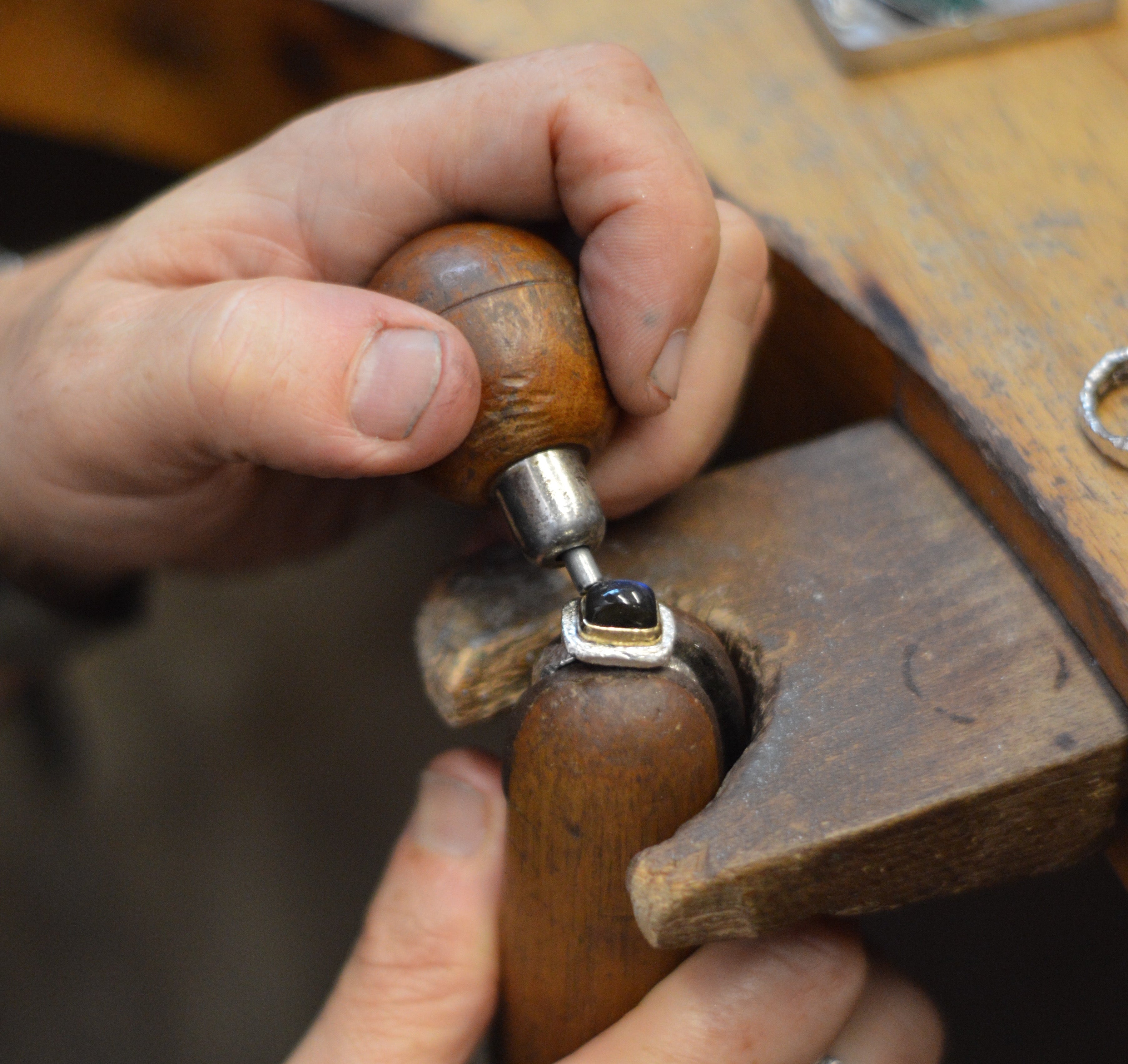 jewellers hands setting stone