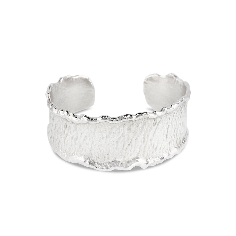 Cuff handcrafted in silver with reticulated edges. - paul magen