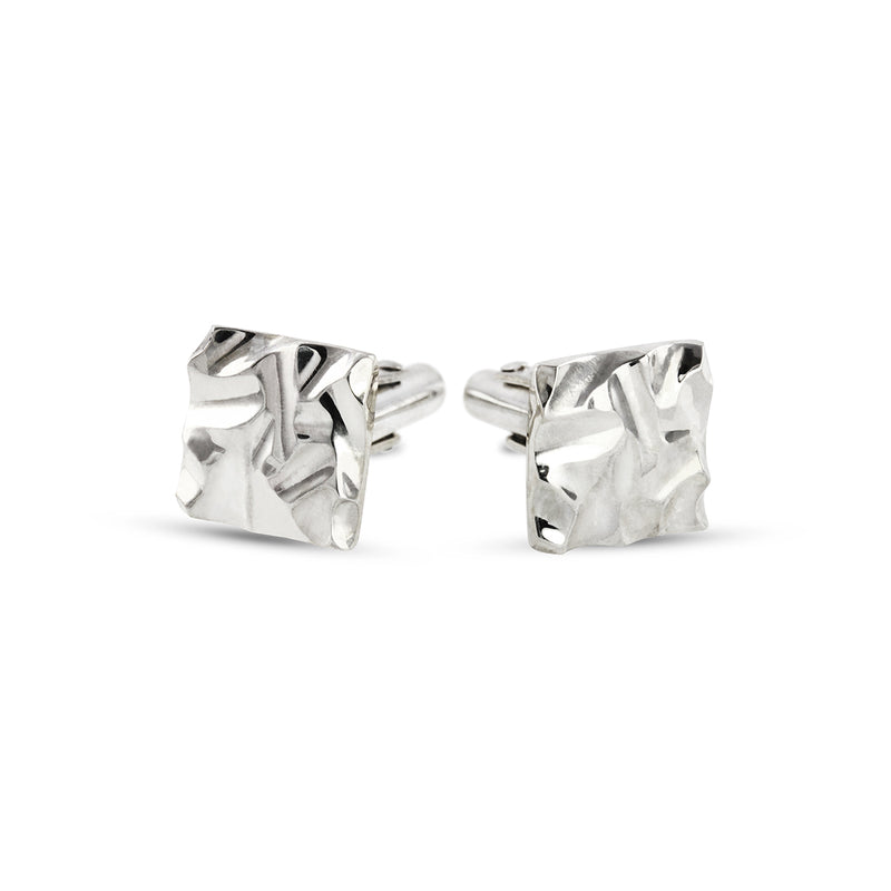 Unique handmade cufflinks with a carved pattern in silver. - paul magen