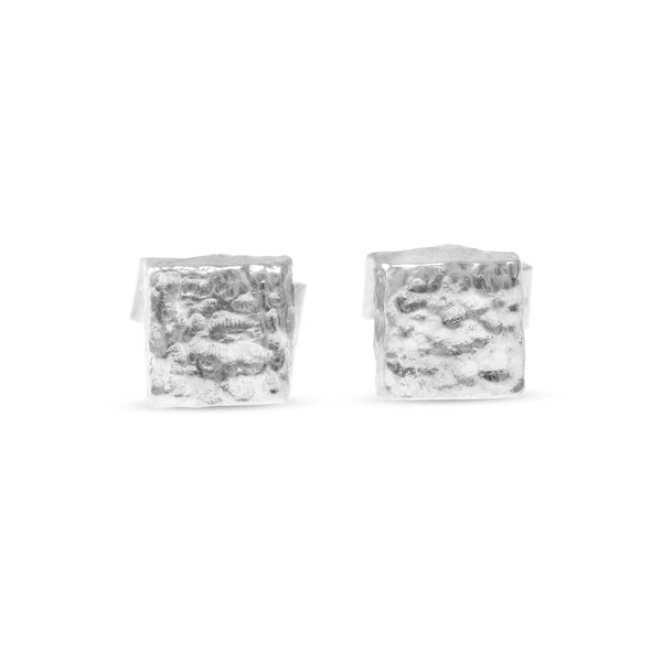 Silver square stud earrings with a hand textured finish. - paul magen