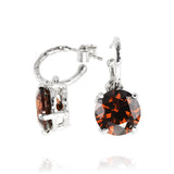 Drop earring in silver set with red cubic zirconia. - paul magen