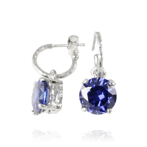 Drop earring in silver set with blue cubic zirconia. - paul magen