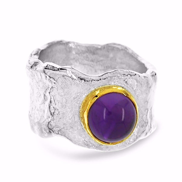 Ring made in silver with  cabochon amethyst set in 18ct gold - paul magen