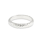 Silver D shaped rings handmade with an organic texture. - paul magen