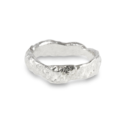 Ring in silver with a unique heavily melted organic texture. – paul magen