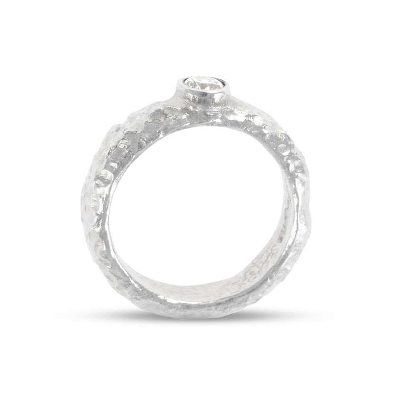 Silver ring hand textured finish with white cubic zirconia. - paul magen