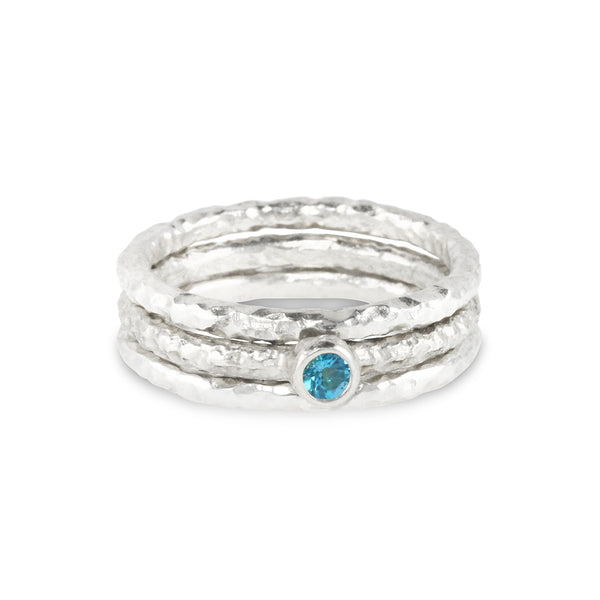 Stacking rings made in silver set with blue topaz. - paul magen