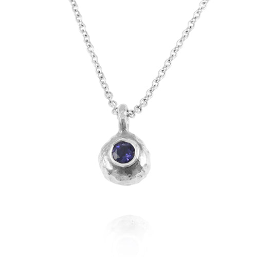 Silver designer pendant set an amethyst on a chain. - paul magen