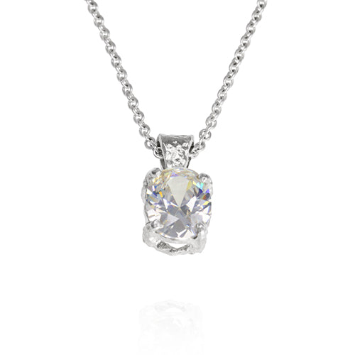 Silver pendant with white cubic zirconia on a trace chain. - paul magen