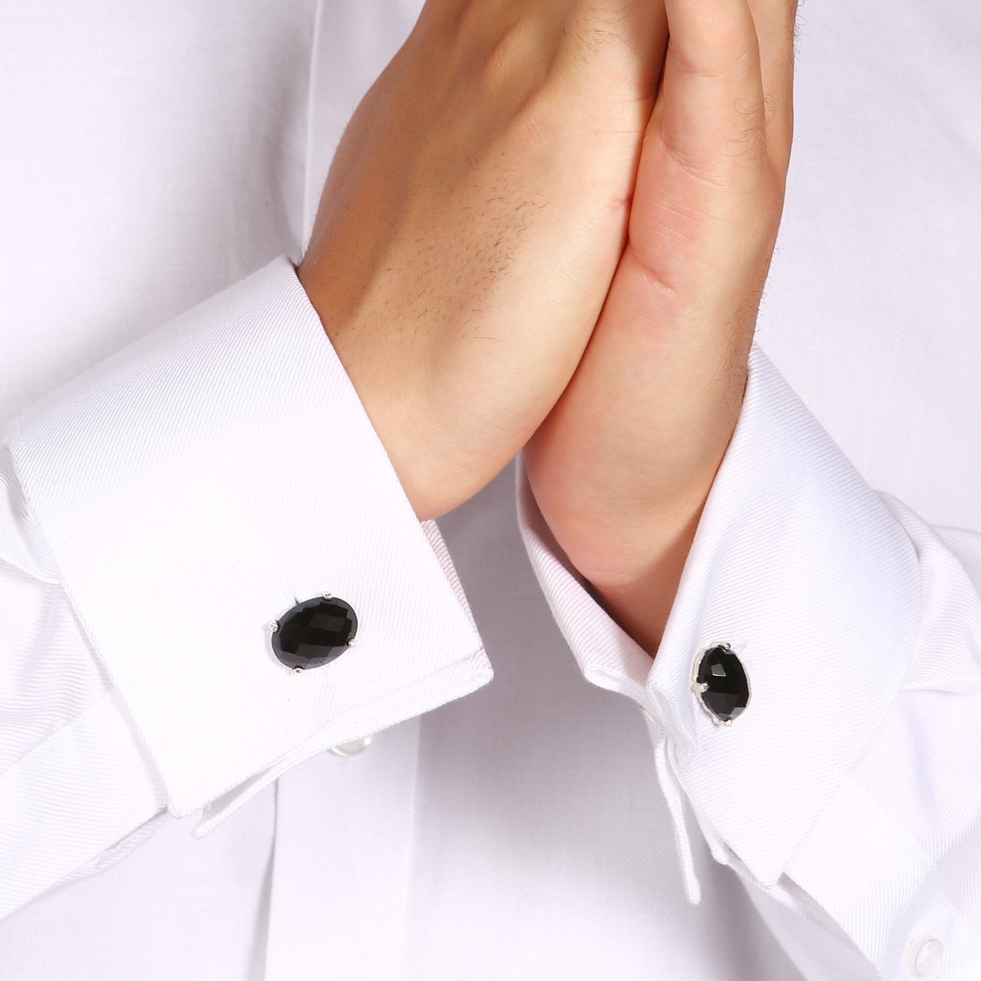 Silver cufflinks claw set with faceted black onyx. - paul magen